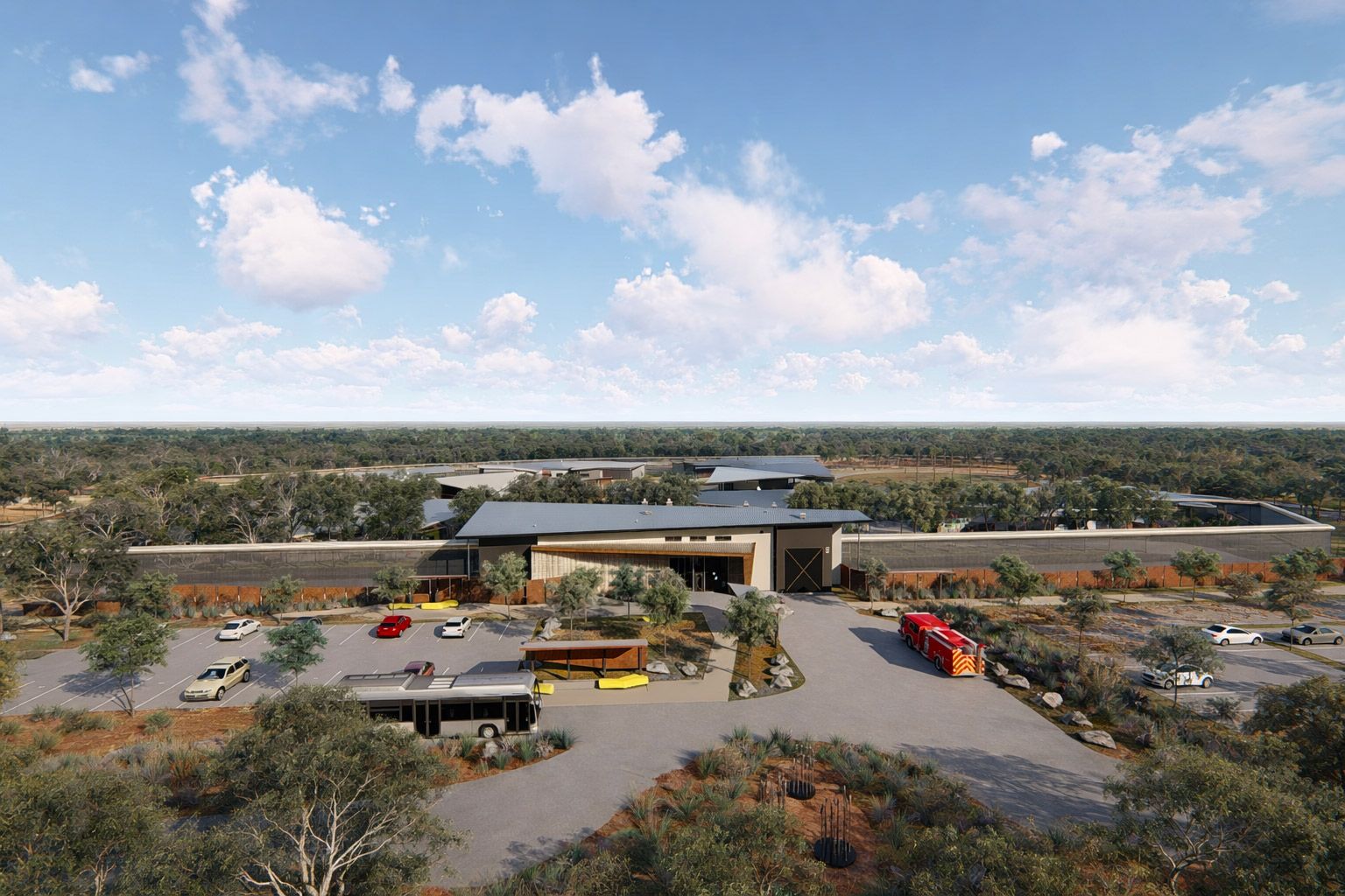 An aerial rendering of a modern visitor center building with a large parking lot in a desert landscape.
