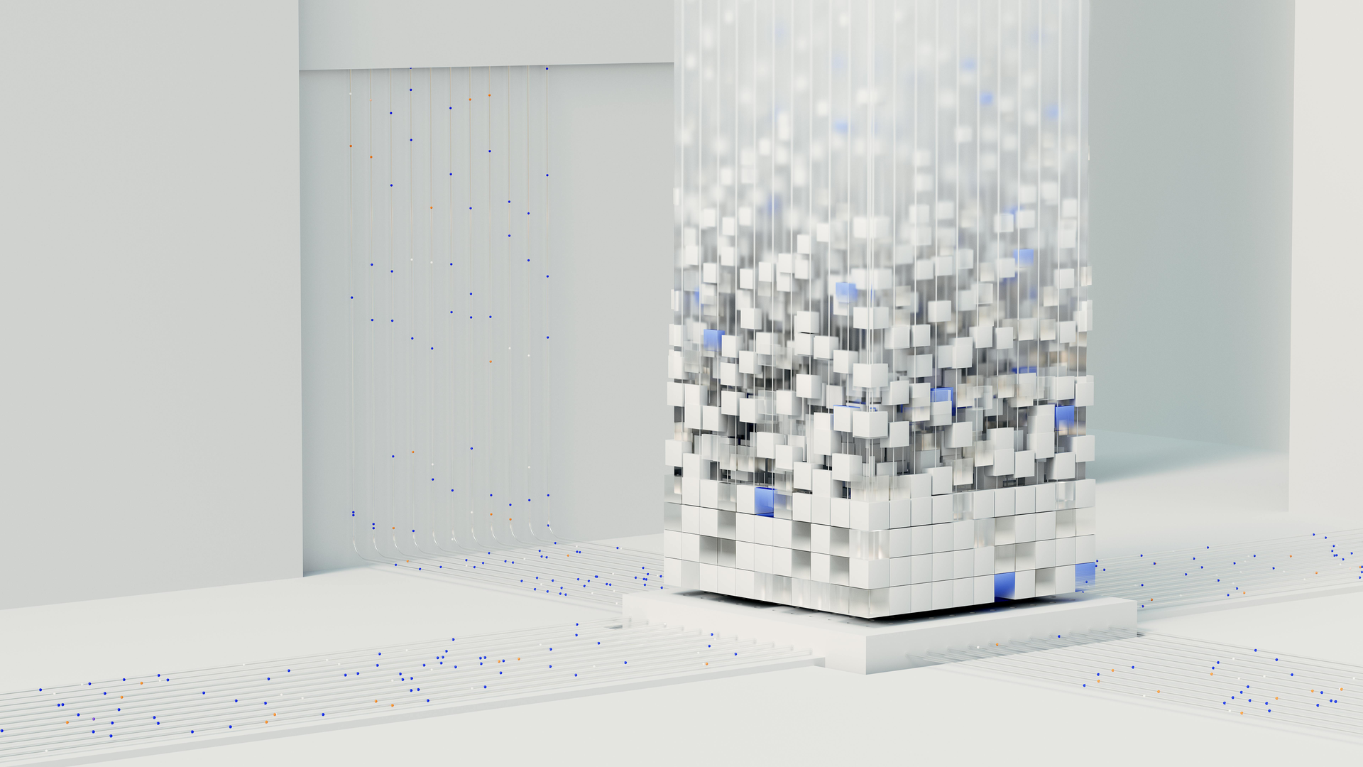 A column of white and blue cubes suspended in a minimalist, bright white space, with scattered particles on the floor.
