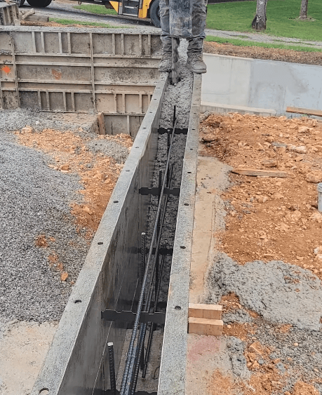 deep concrete foundation ready to be poured