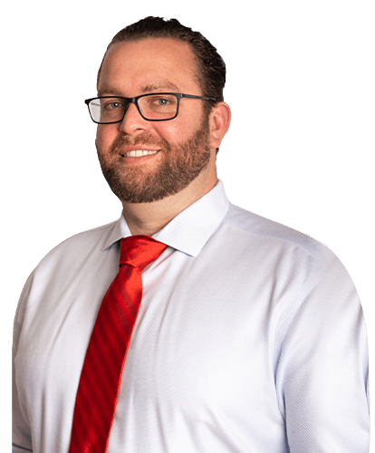 A man with a beard and glasses in a red tie and white shirt, personal injury & defense attorney in PA, NJ & FL.