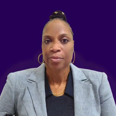 Female Instructor In Coat — Raleigh, NC — iNEXG-BDS LLC