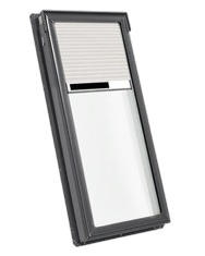 A rectangular skylight with a dark frame and clear glass pane, shown from an angled, top-down perspective.