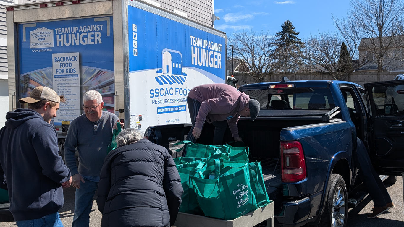 Food Resources Volunteer Unloading Truck