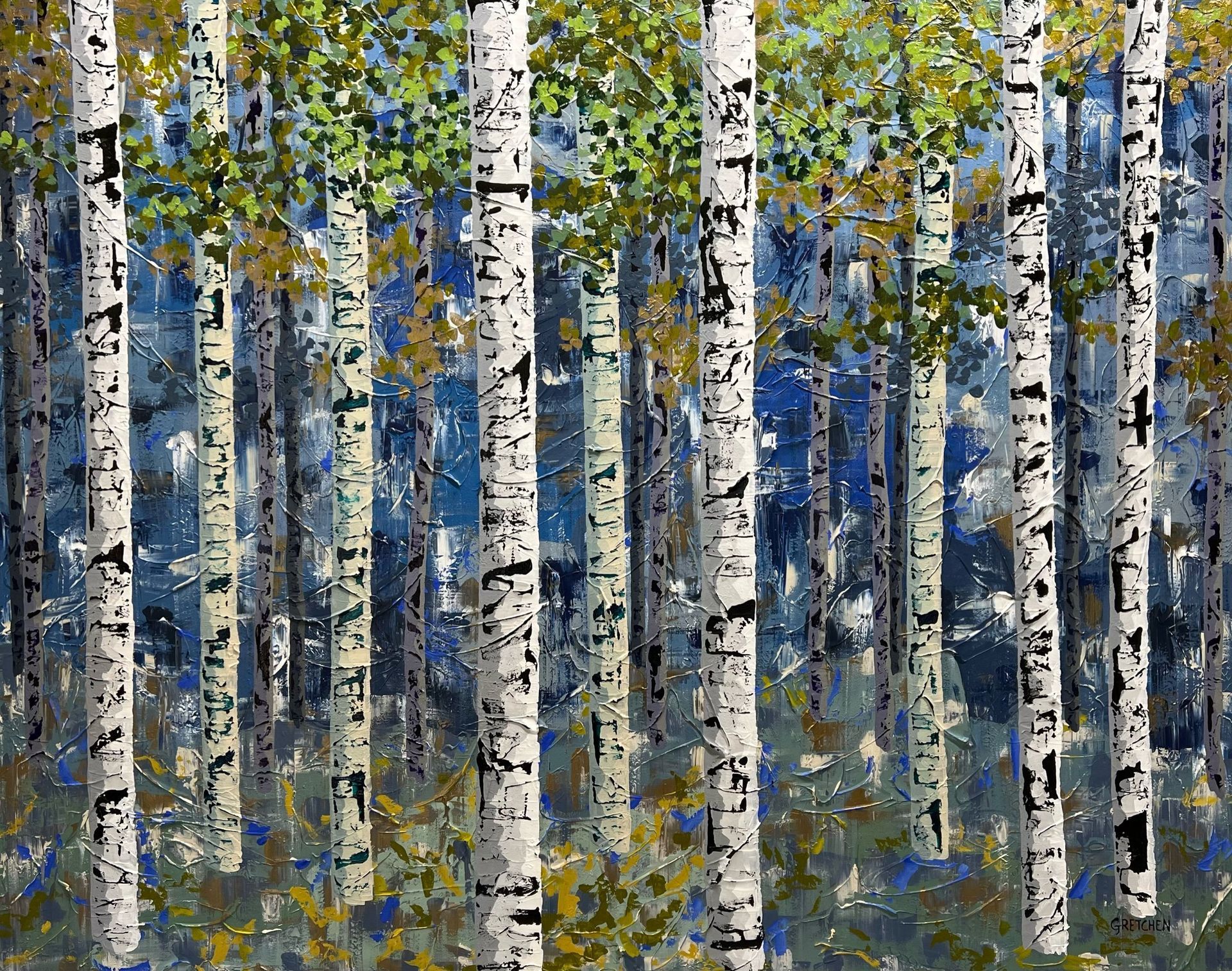 Aspen trees in a forest with white trunks, green and yellow leaves, and a blue background.