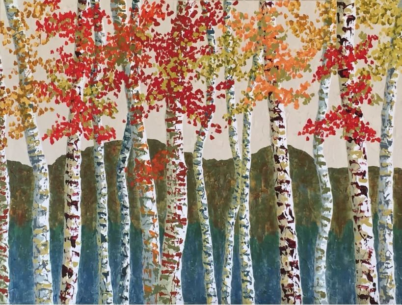 Birch trees with colorful fall foliage; red, orange, and yellow leaves against the white bark.