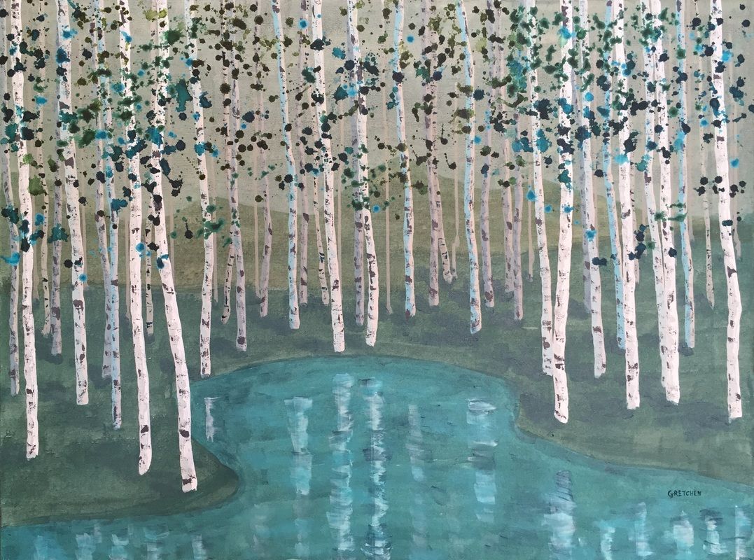 Birch trees with white bark and turquoise leaves reflect in a teal pond in a forest.