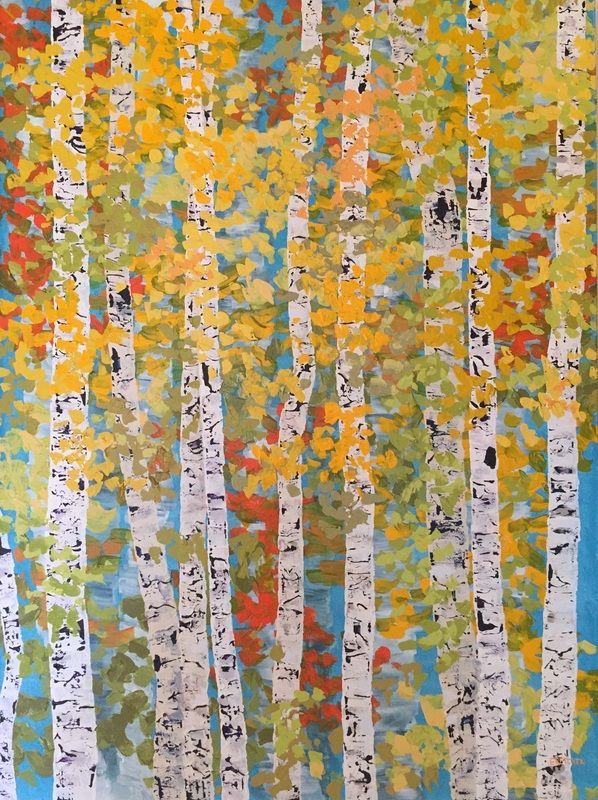 Birch trees with white bark and golden leaves, against a blue sky.