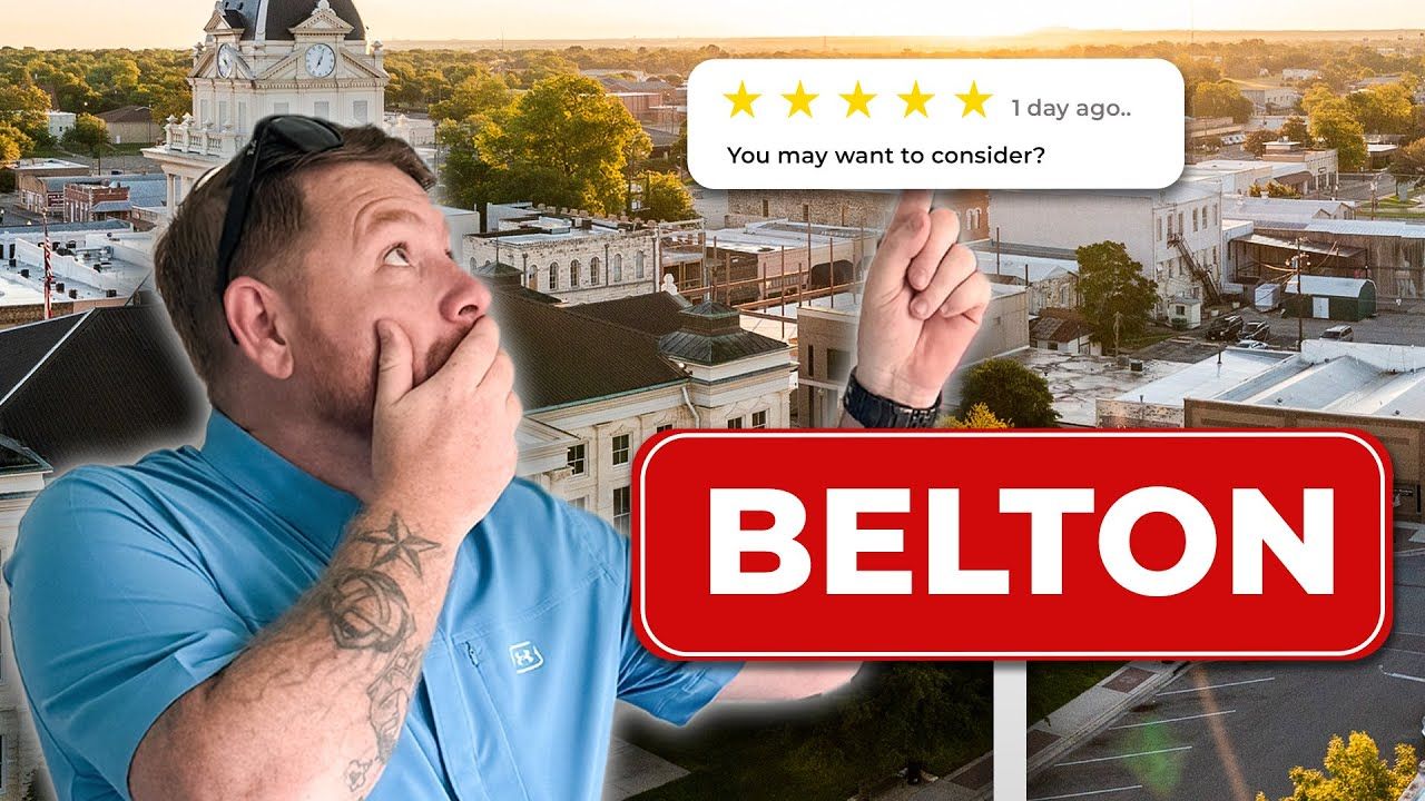 A man is standing in front of a sign that says belton.