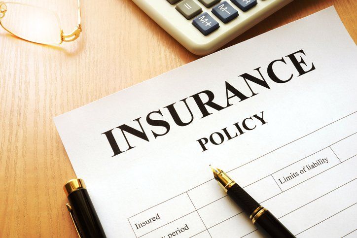 Insurance Policy on a Desk — Port Charlotte, FL — Spinnaker Insurance Agency