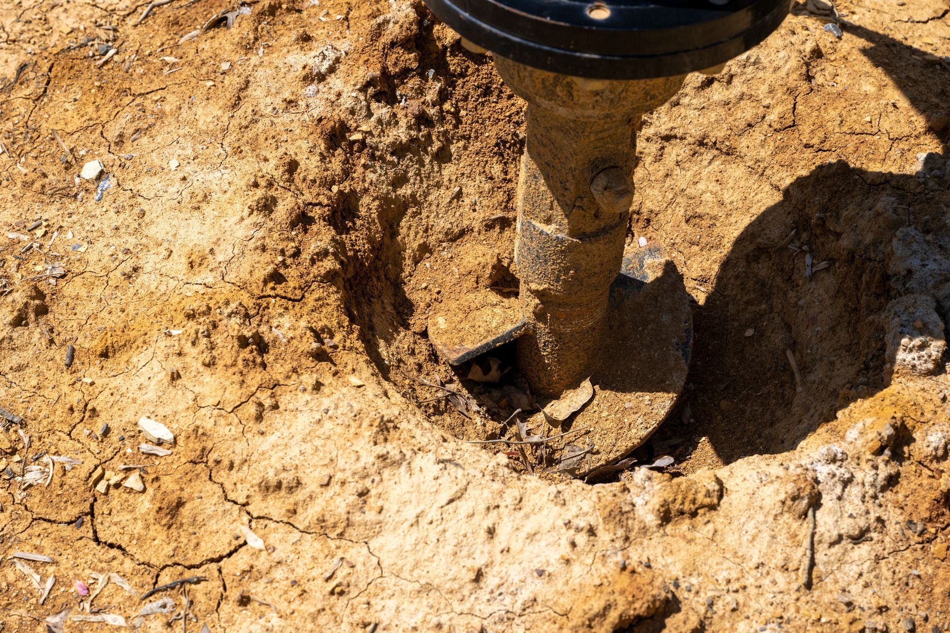 A Machine is Digging a Hole in the Ground