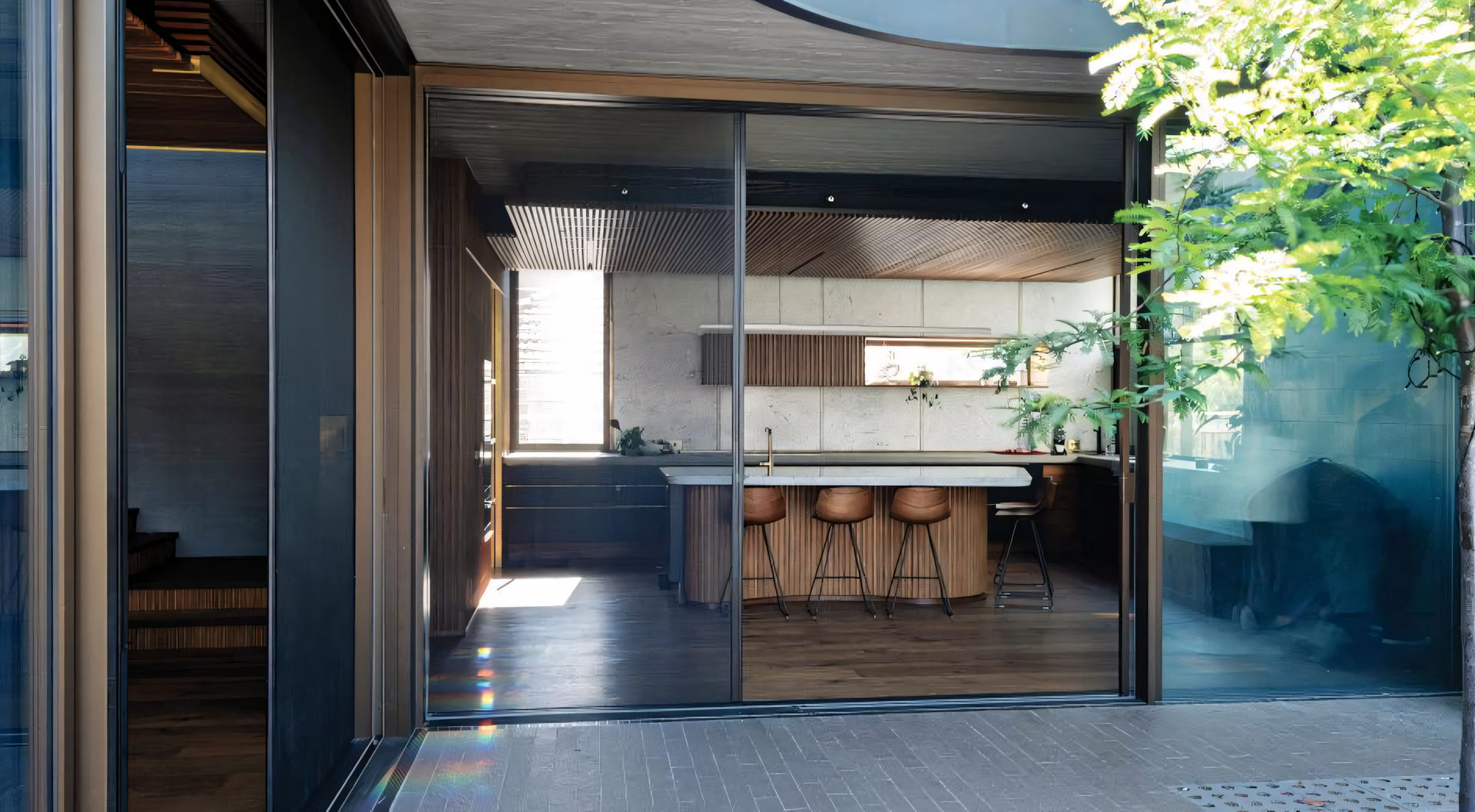 A kitchen with a sliding glass door leading to it. — Roo’s Door & Window Maintenance In Sippy Downs, QLD