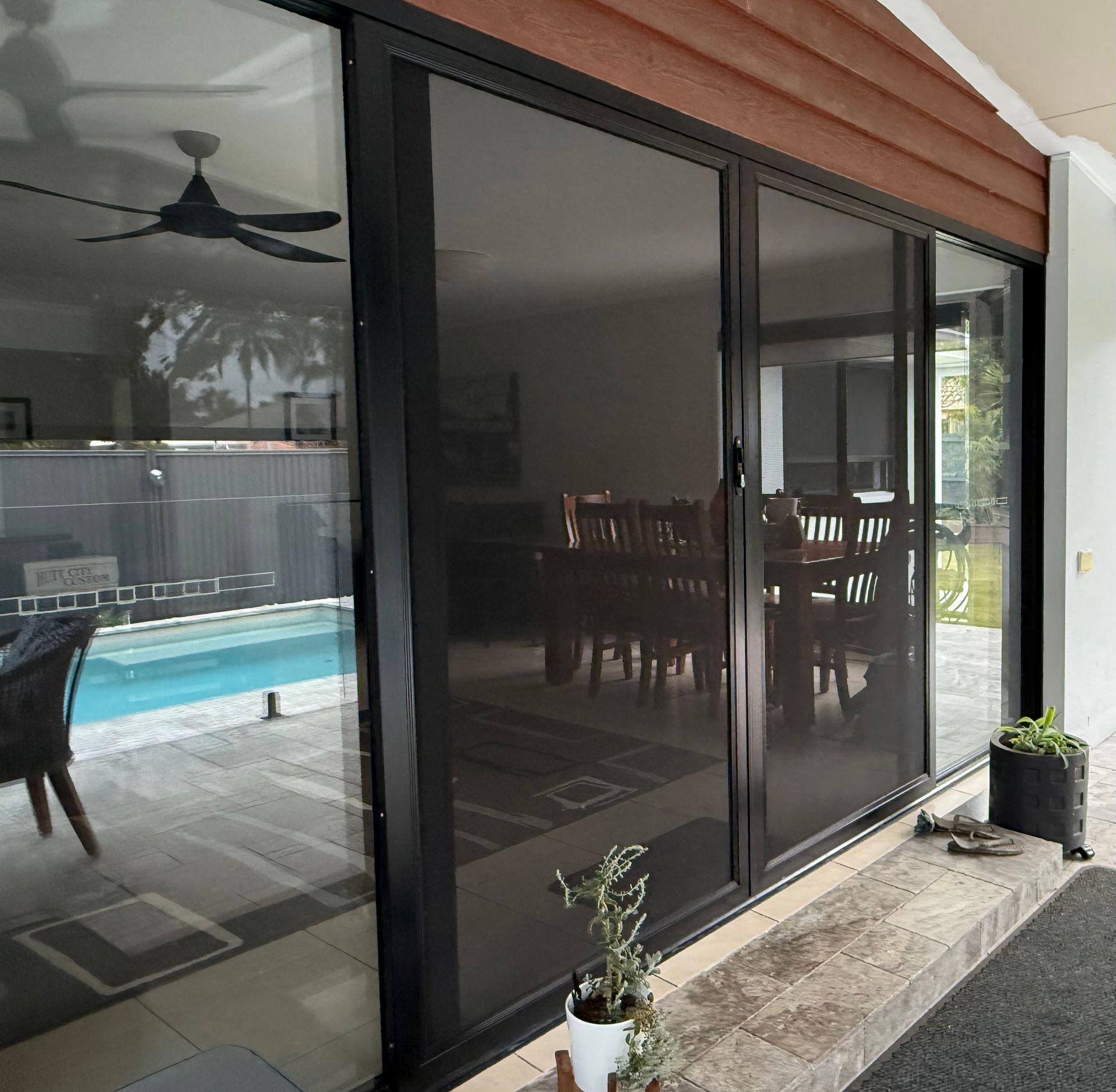 A Picture Frame Is Hanging On A White Wall — Roo’s Door & Window Maintenance In Sippy Downs, QLD