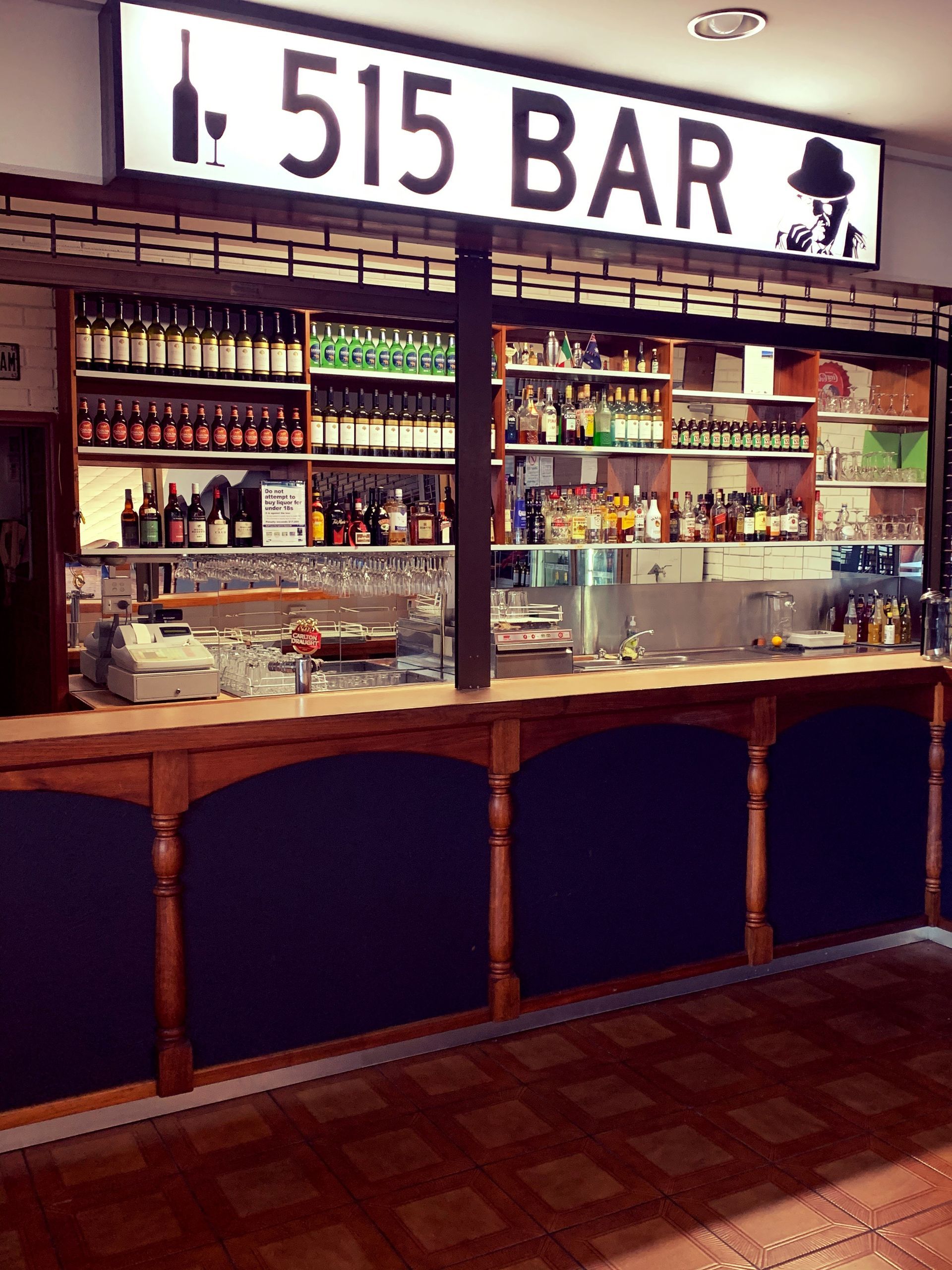 A bar with a sign that says ' 515 bar ' on it