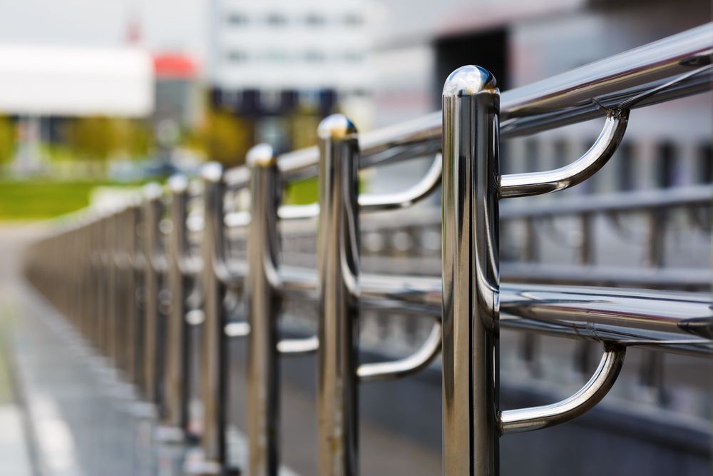 Shiny, chrome railing along a walkway in an urban setting. — Metaltrendz in Kunda Park, QLD