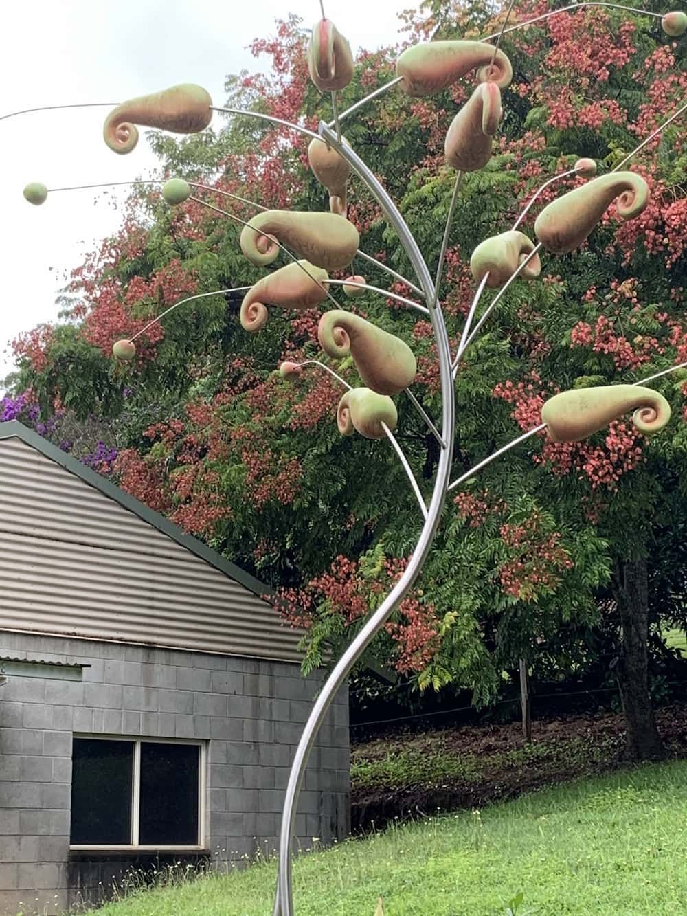 Metal sculpture of a tree with gold, swirling seed pods — Metaltrendz in Kunda Park, QLD