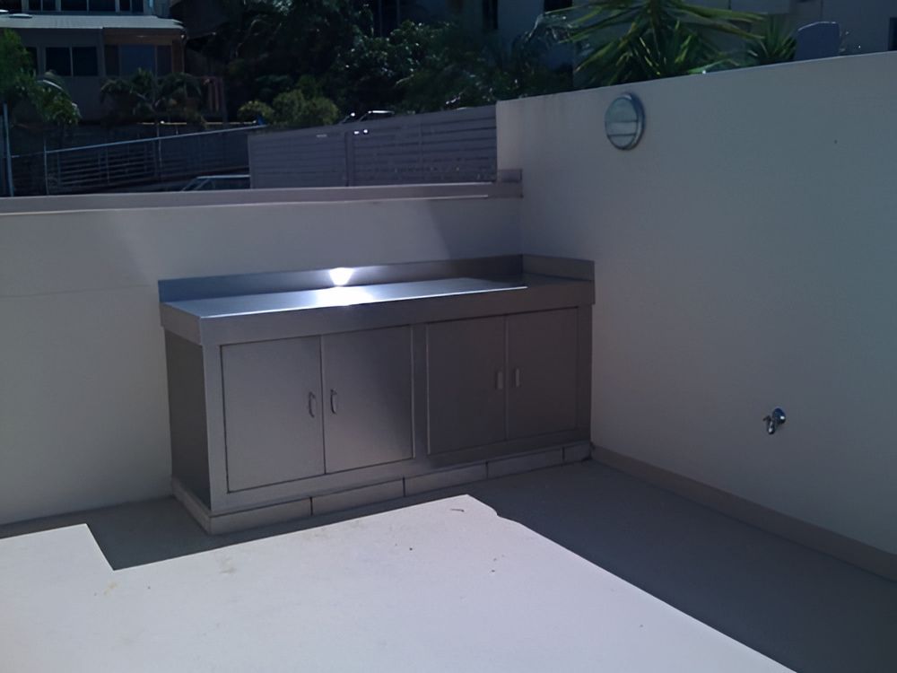 A Stainless Steel Cabinet With a White Wall Behind It — Metaltrendz in Kunda Park, QLD