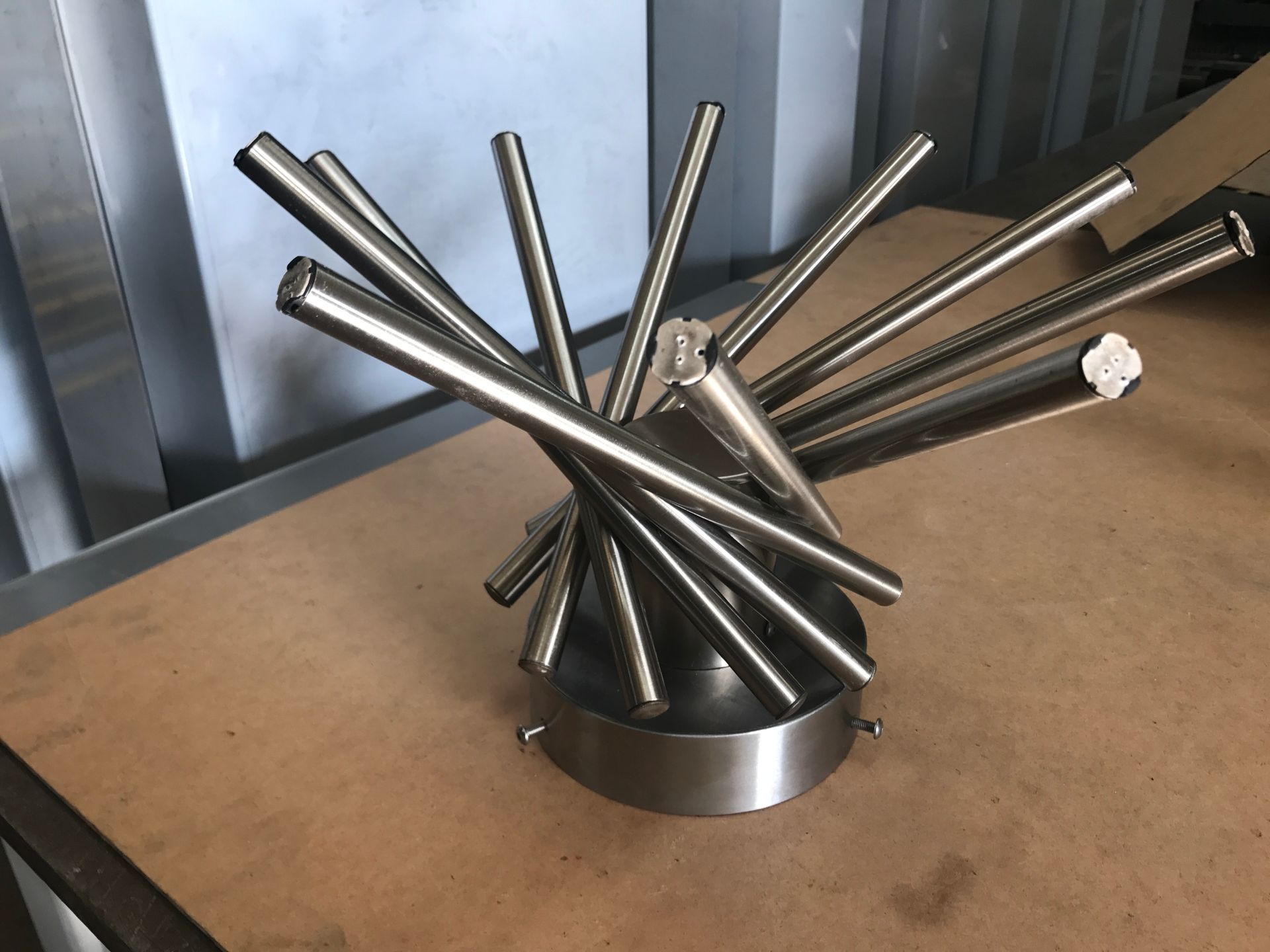 A Stainless Steel Propeller is Sitting on a Wooden Floor — Metaltrendz in Kunda Park, QLD