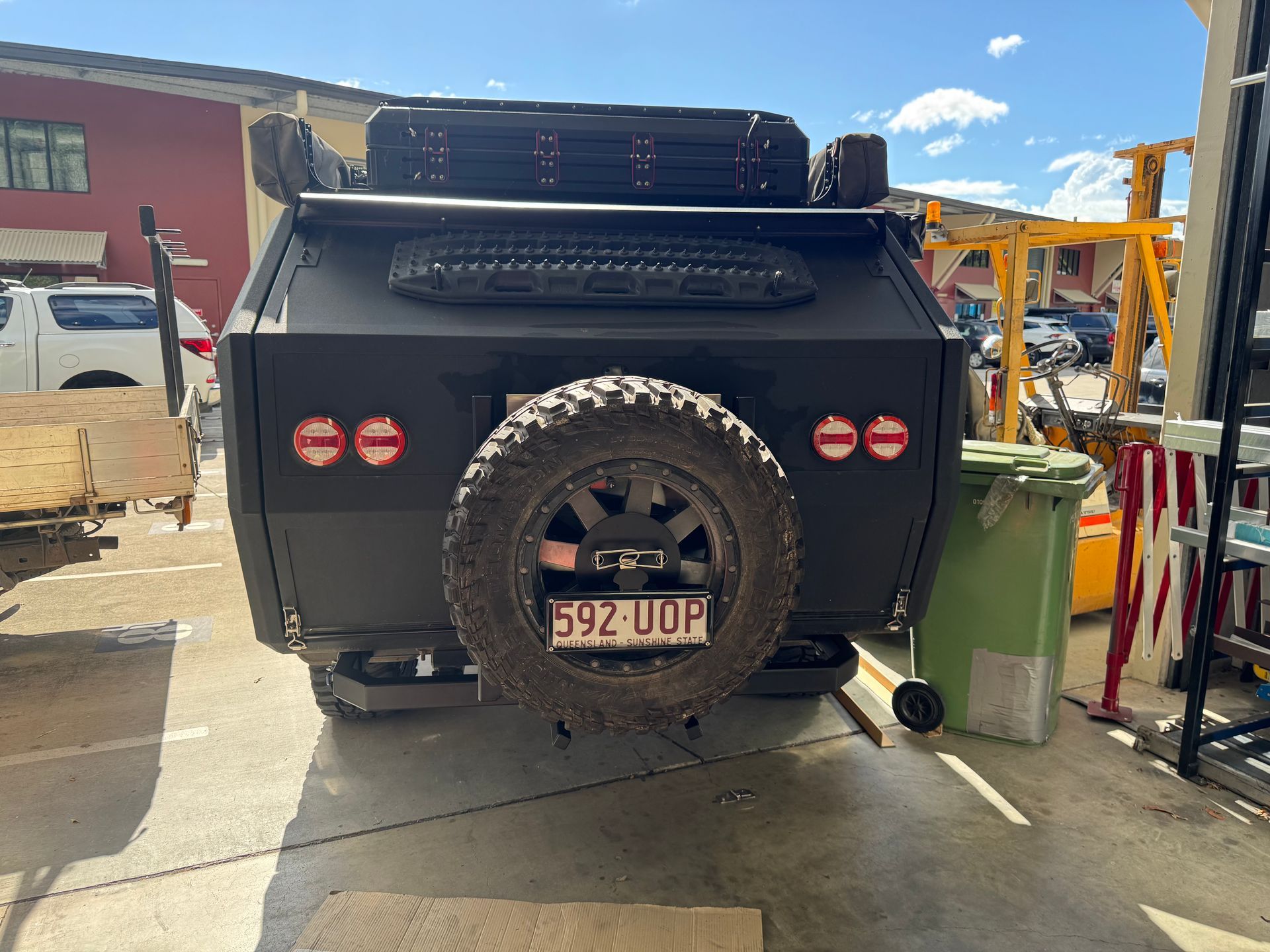 Black off-road camper trailer with spare tire — Metaltrendz in Kunda Park, QLD