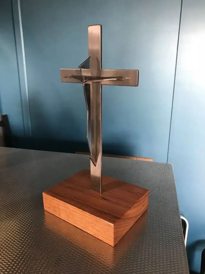 A Small Stainless Steel Cross on a Wooden Base — Metaltrendz in Buderim, QLD