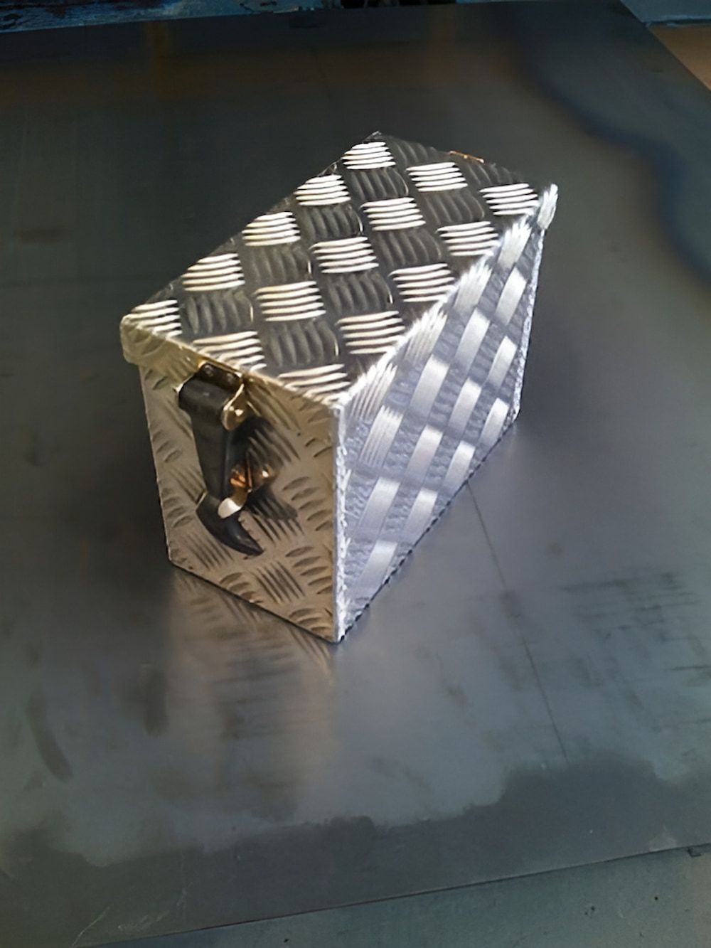 A Metal Box With a Checkered Pattern is Sitting on a Metal Surface — Metaltrendz in Kunda Park, QLD