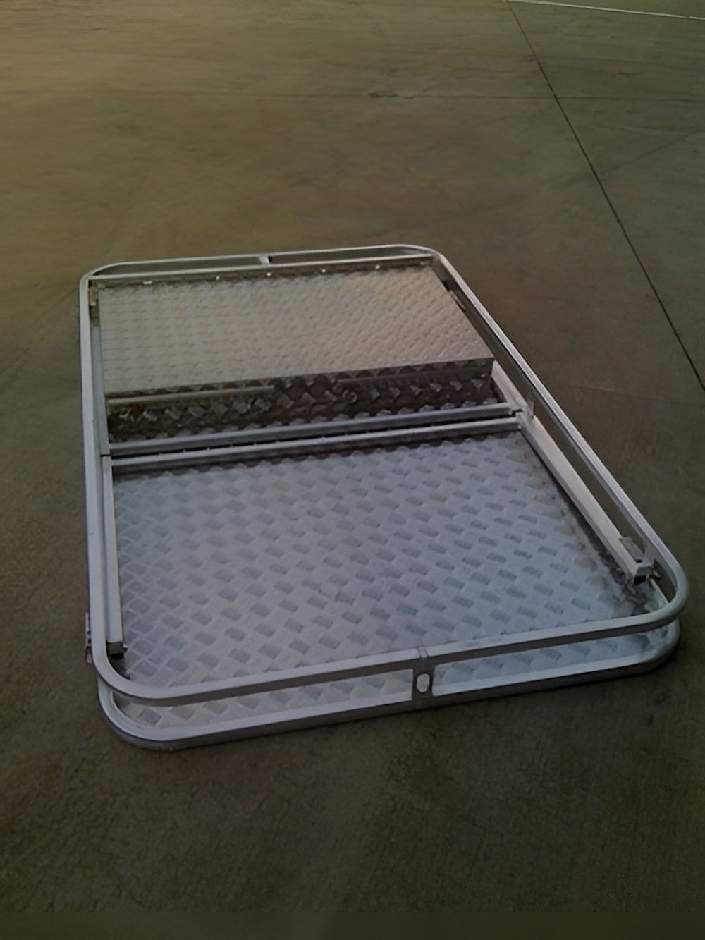 A Metal Roof Rack is Sitting on the Ground — Metaltrendz in Kunda Park, QLD