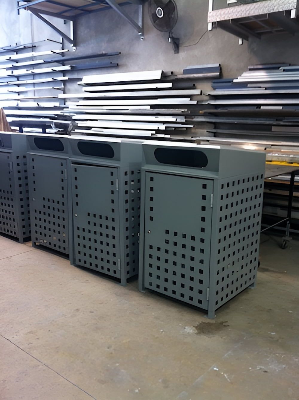 A Row of Trash Cans Are Lined Up in a Warehouse — Metaltrendz in Kunda Park, QLD
