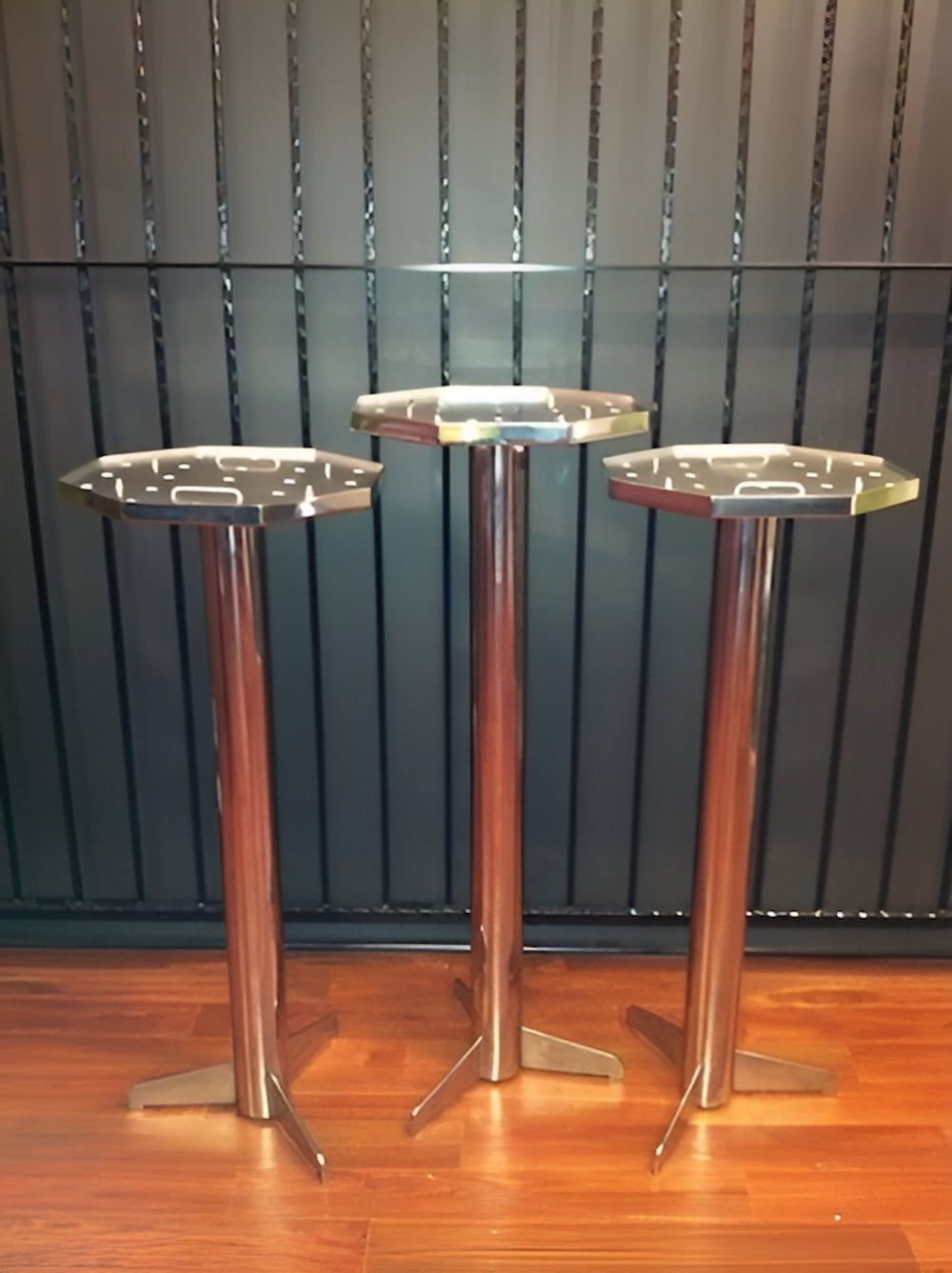 Three Stainless Steel Tables Are Lined Up on a Wooden Floor — Metaltrendz in Kunda Park, QLD