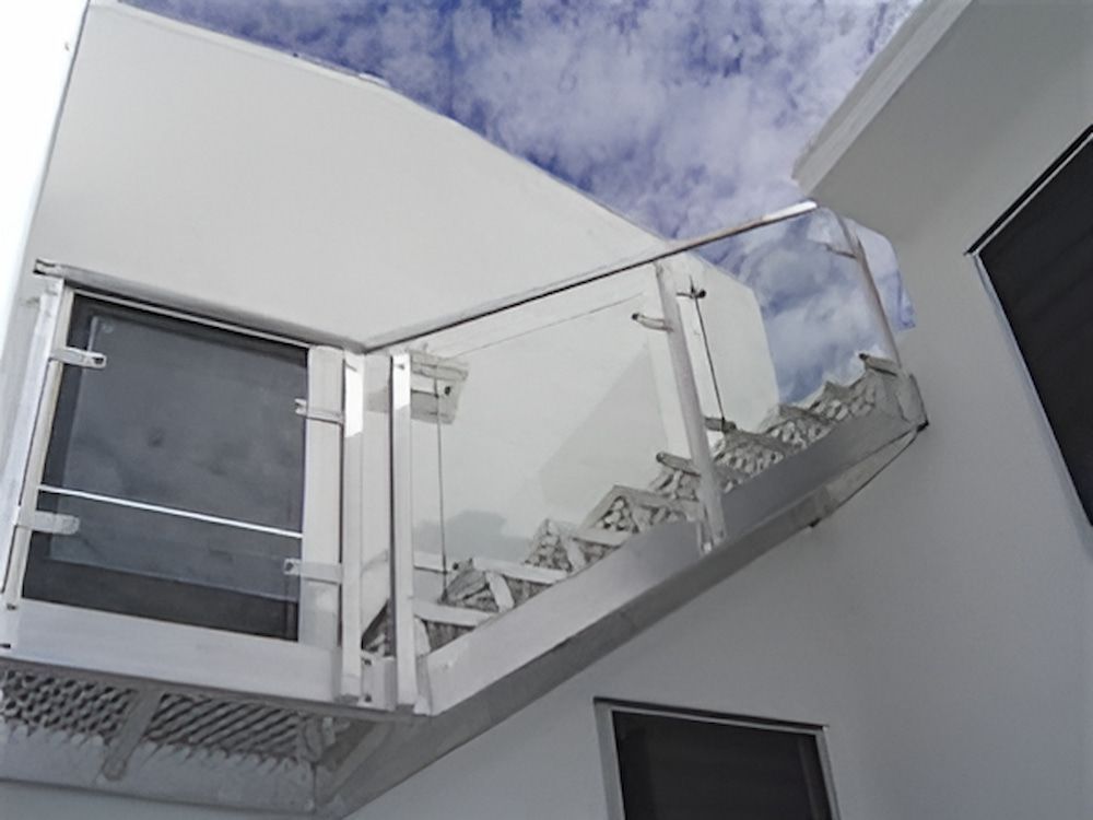 A White Building With Stairs and a Glass Railing — Metaltrendz in Kunda Park, QLD
