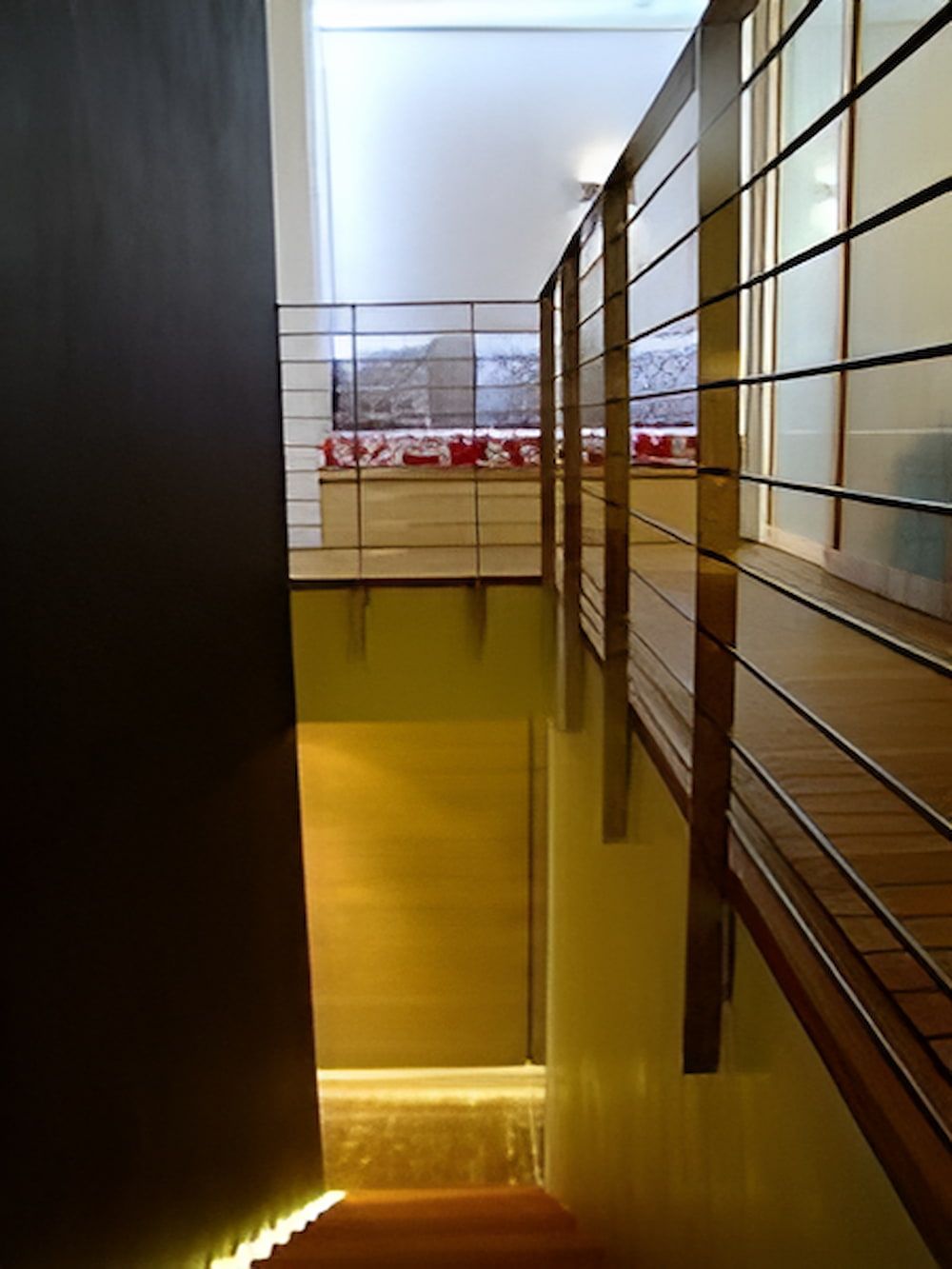 Wooden walkway with stainless steel railing overlooks a well-lit stairway — Metaltrendz in Kunda Park, QLD