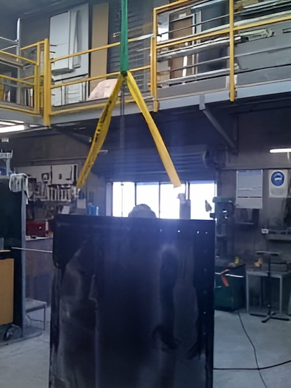 A Large Black Box is Being Lifted by a Yellow Crane — Metaltrendz in Kunda Park, QLD