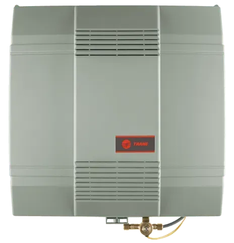 Gray Trane whole-house humidifier with vents, a water valve, and the Trane logo.