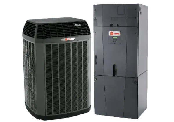 Dark gray Trane air conditioning unit and furnace on white background.