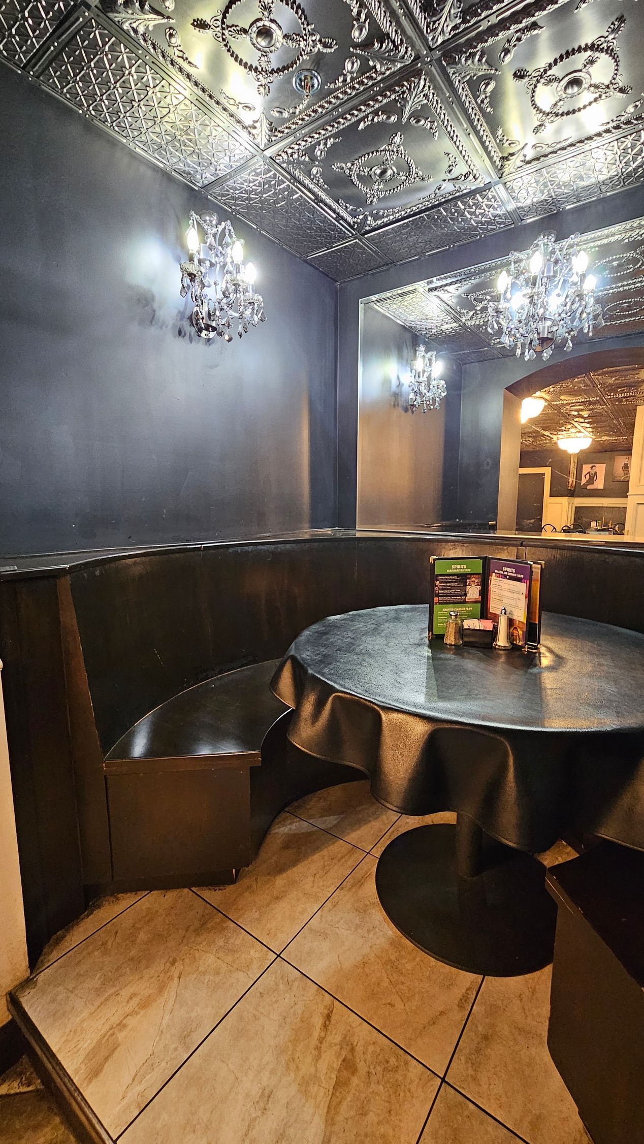 There is a table in the middle of the room.