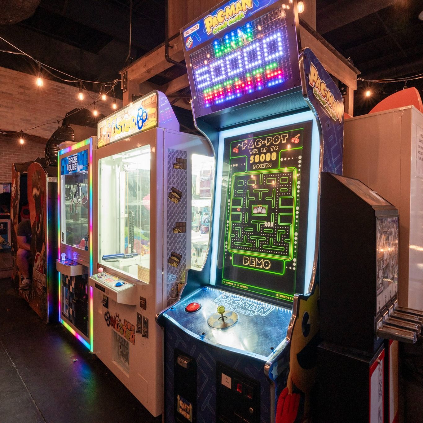 An arcade with a machine that says win 5000 points