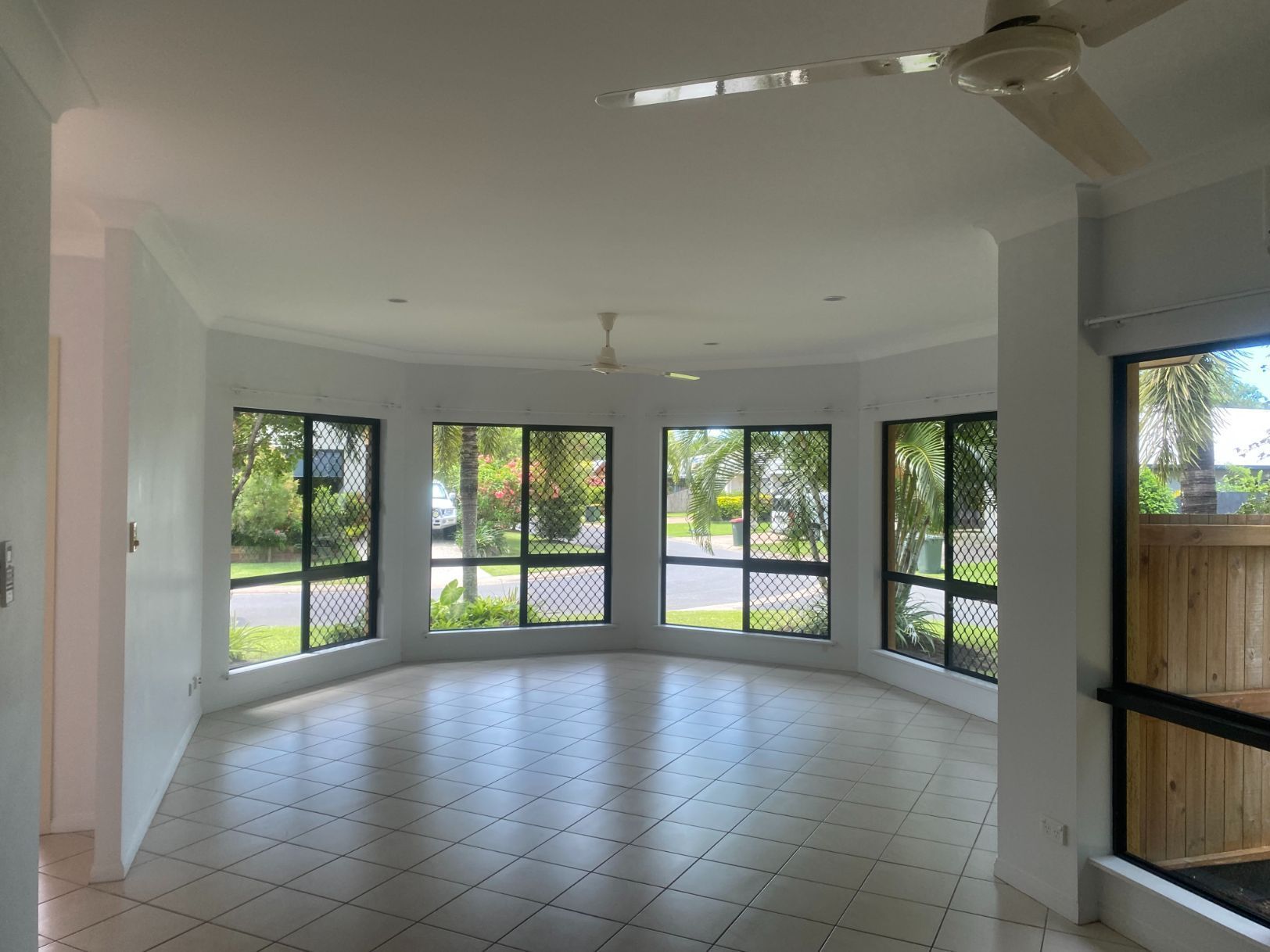 A Freshly Painted White Living Room — Painting & Maintenance FNQ Handyman Service in Clifton Beach, QLD