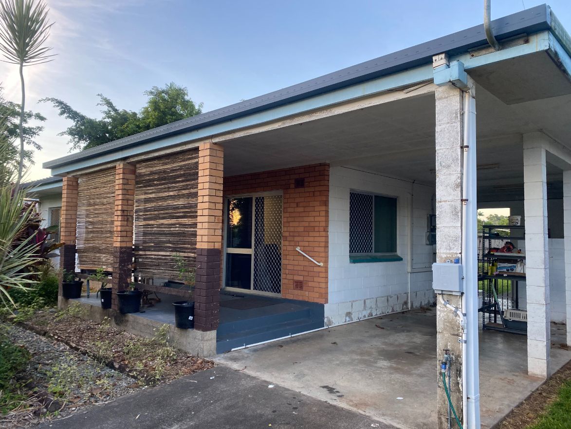 A White House with A Green Gutter— Painting & Maintenance FNQ Handyman Service in Clifton Beach, QLD