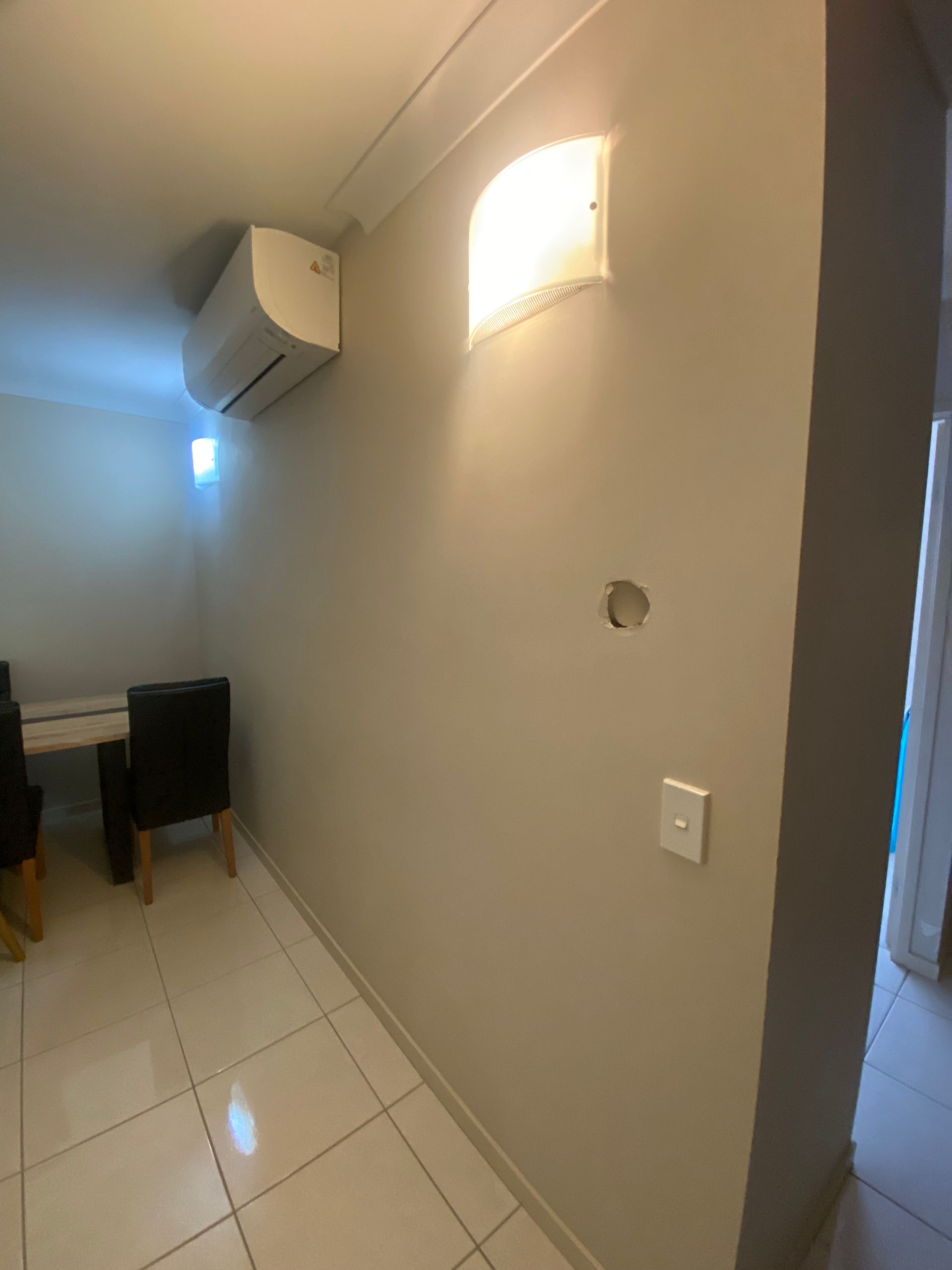 A room with a desk and chairs in it — Painting & Maintenance FNQ Handyman Service in Clifton Beach, QLD