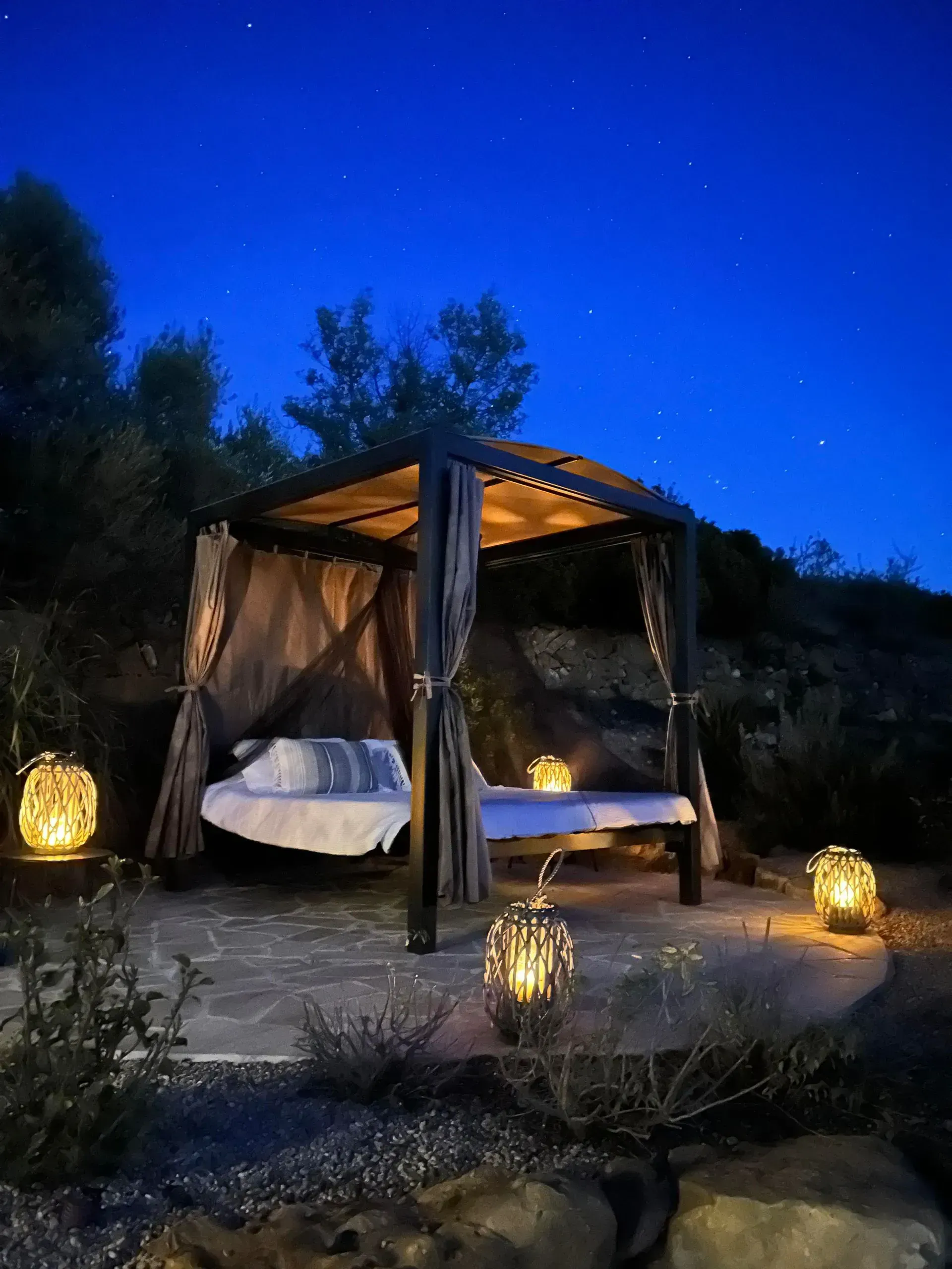 Casa de Olivos outdoor four poster bed under the stars