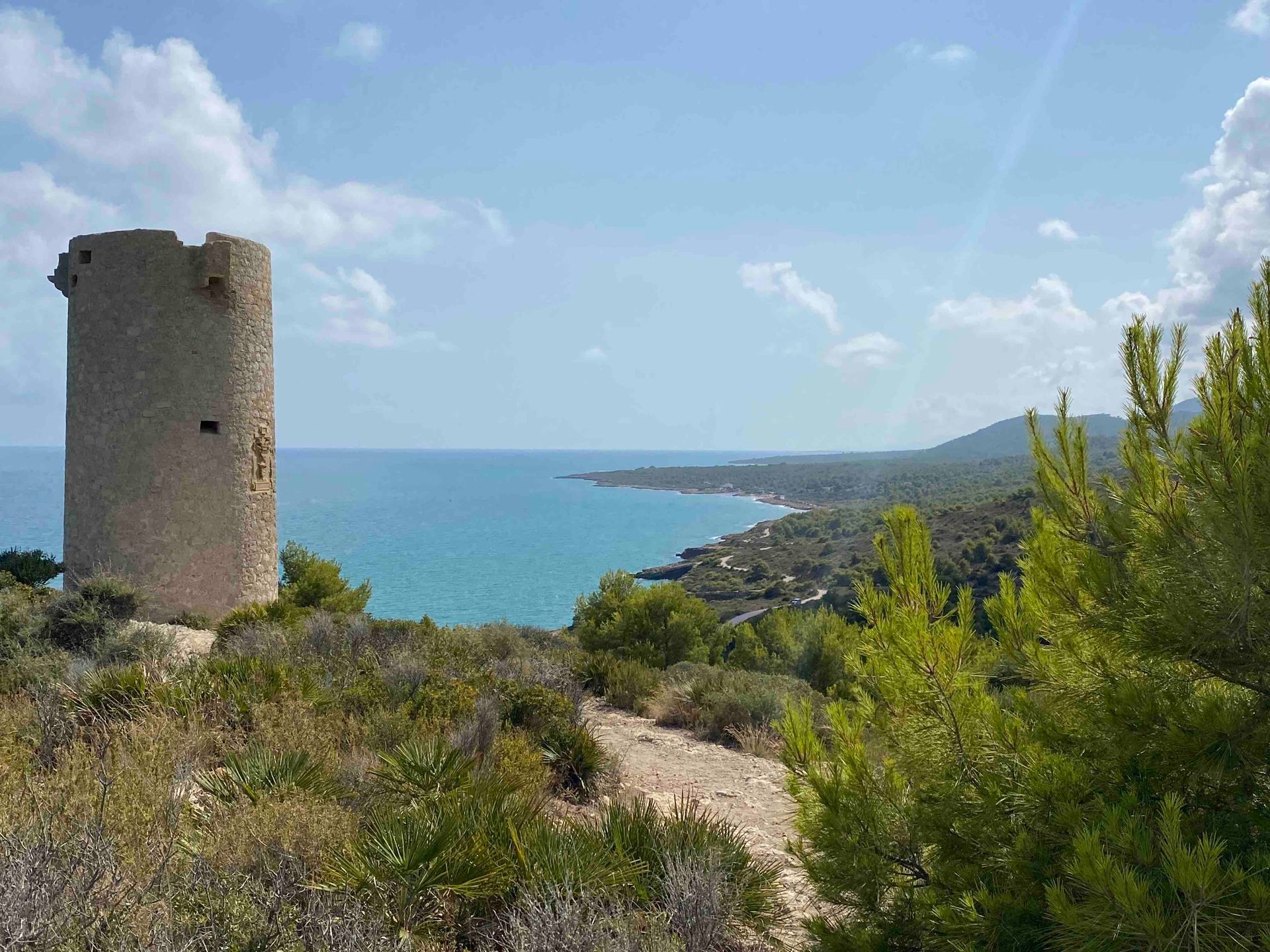 Natural parc Serra d'Irta view of turret by sea near Casa de Olivos