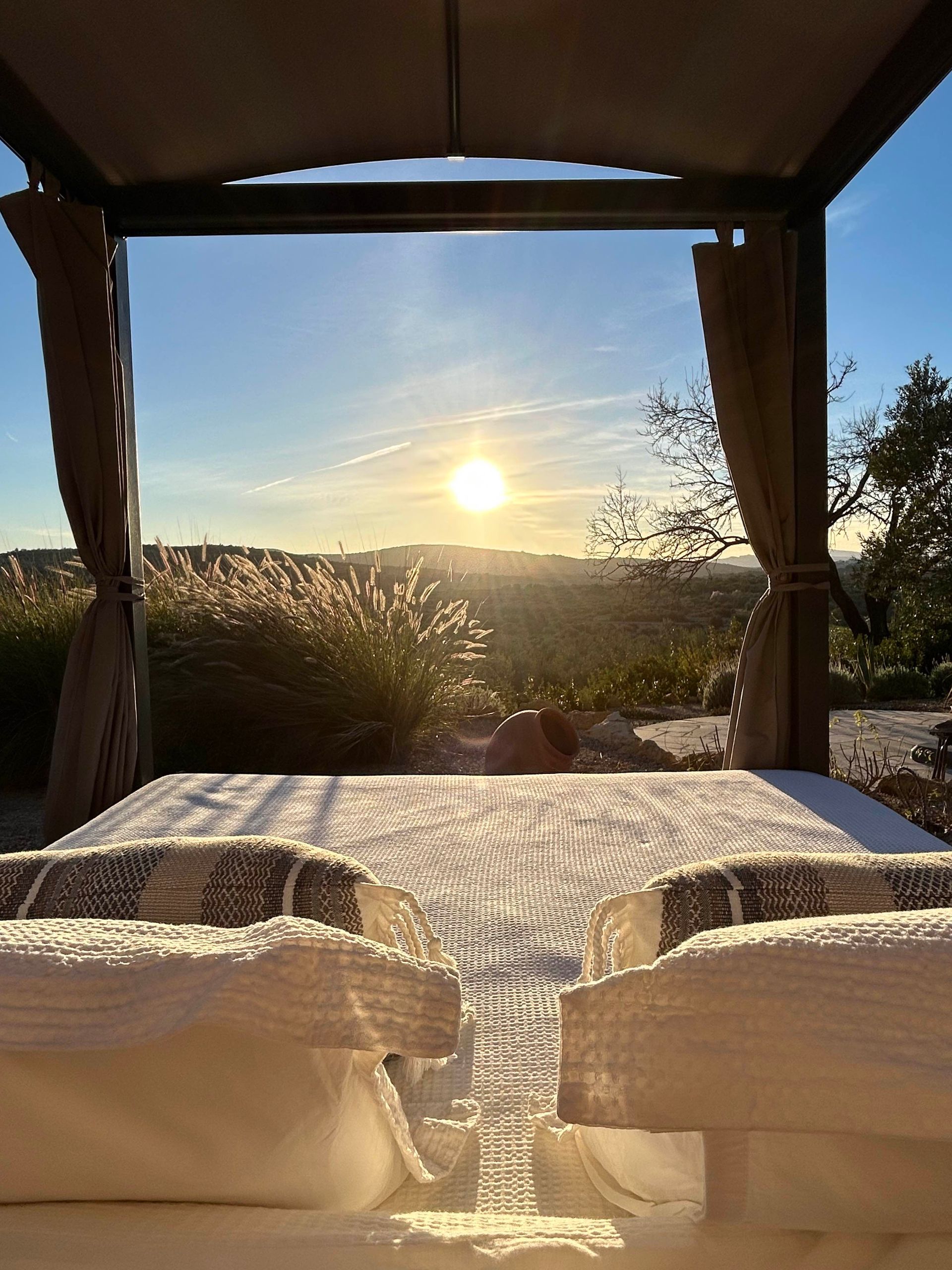 Beautiful sunset viewed from the four poster bed from the Casa de Olivos gardens near Traiguera