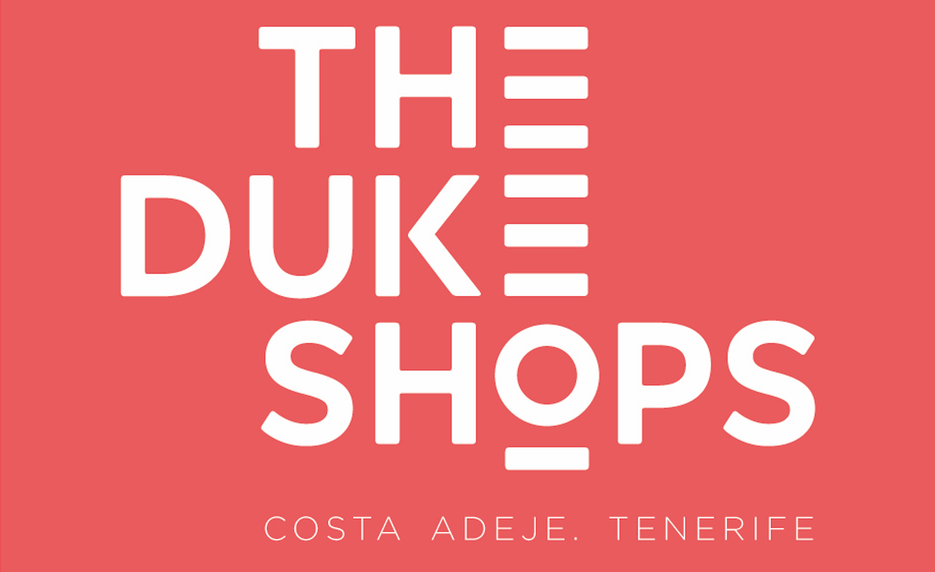 The logo for the duke shops is red and white