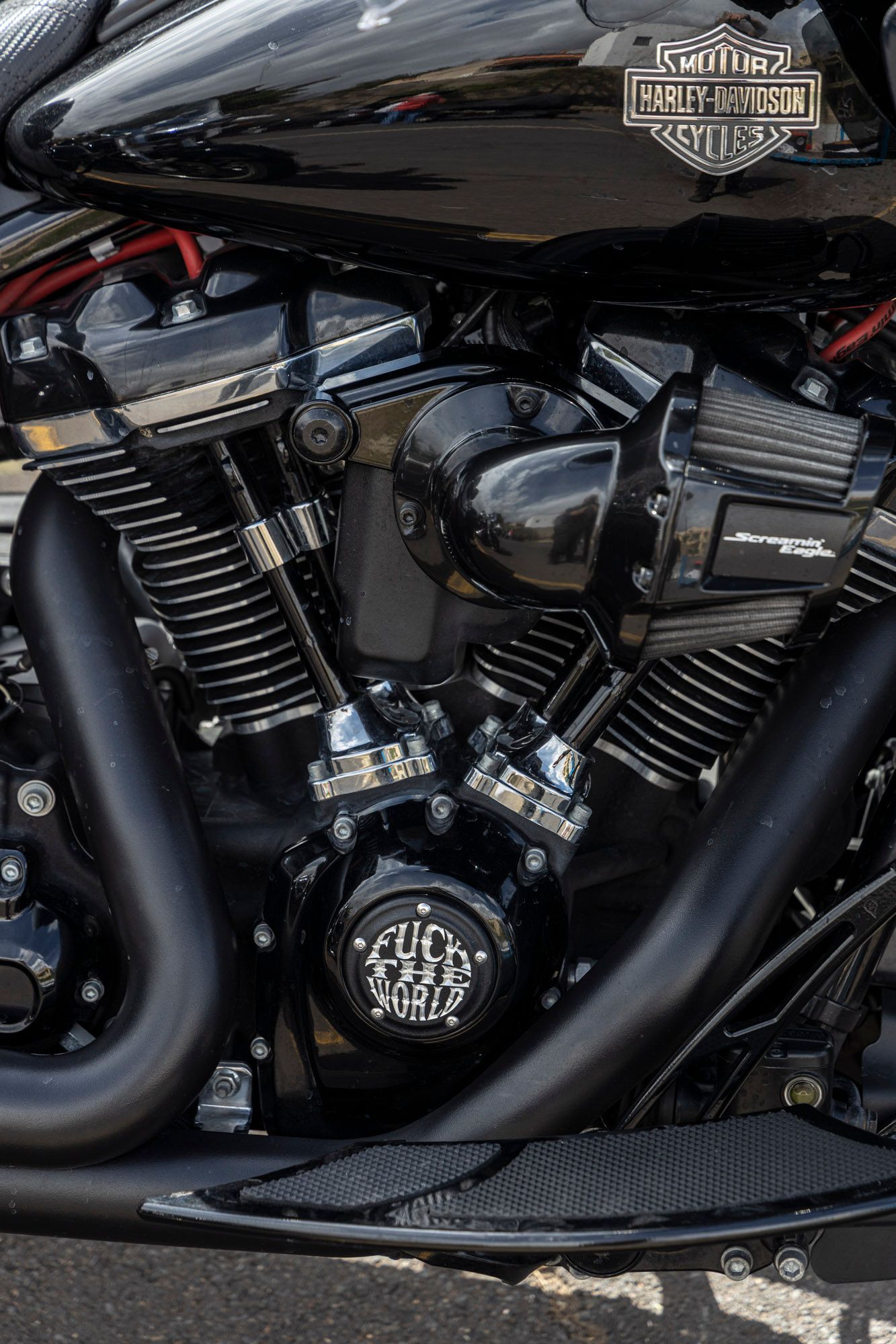 A close up of the engine of a harley davidson motorcycle.