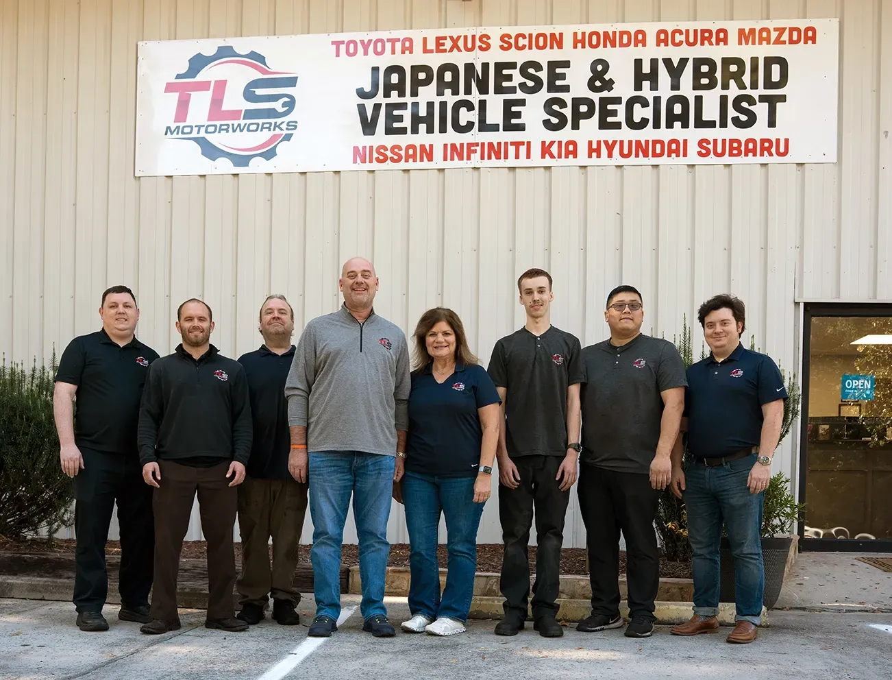 Team Posed Outside of Shop in Chamblee, GA | TLS Motorworks
