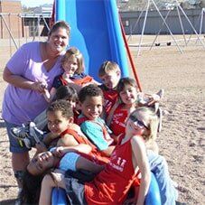 Teacher with students - Child Care in Colorado Sprinigs, CO