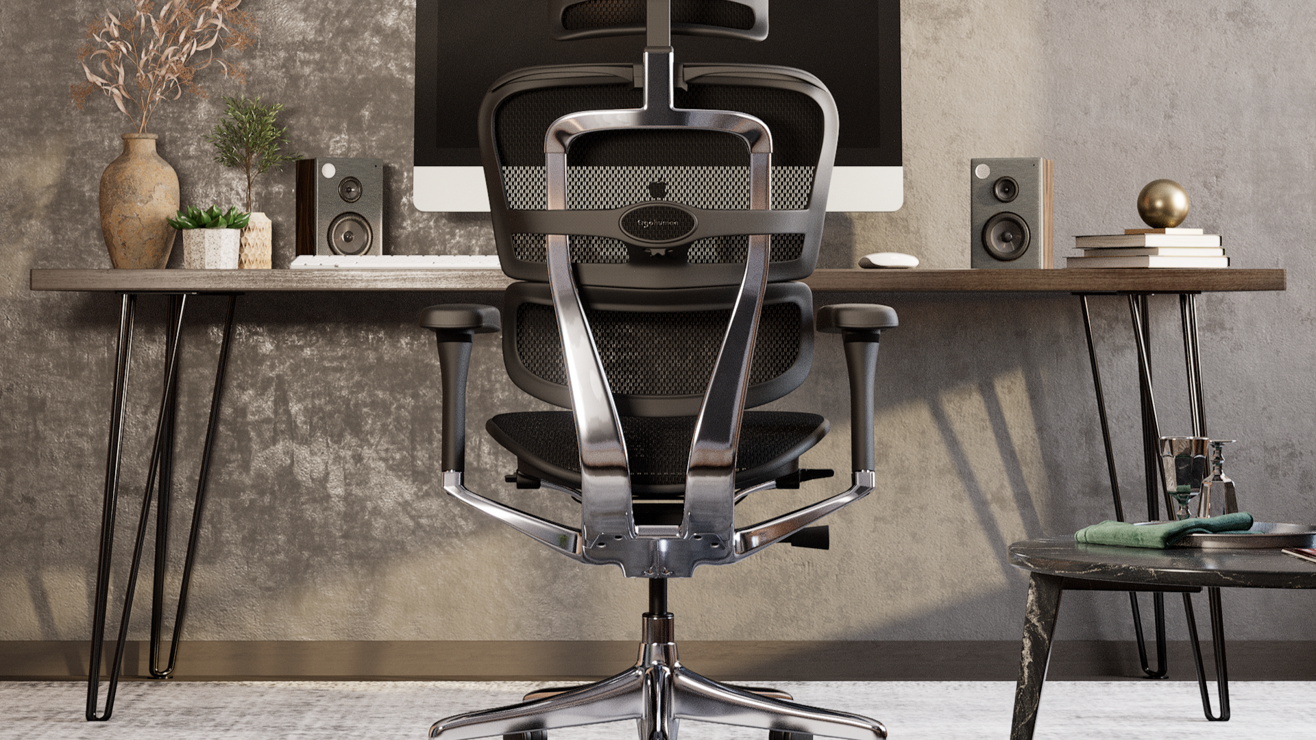 Black Ergohuman Elite office chair at a desk in a home office environment