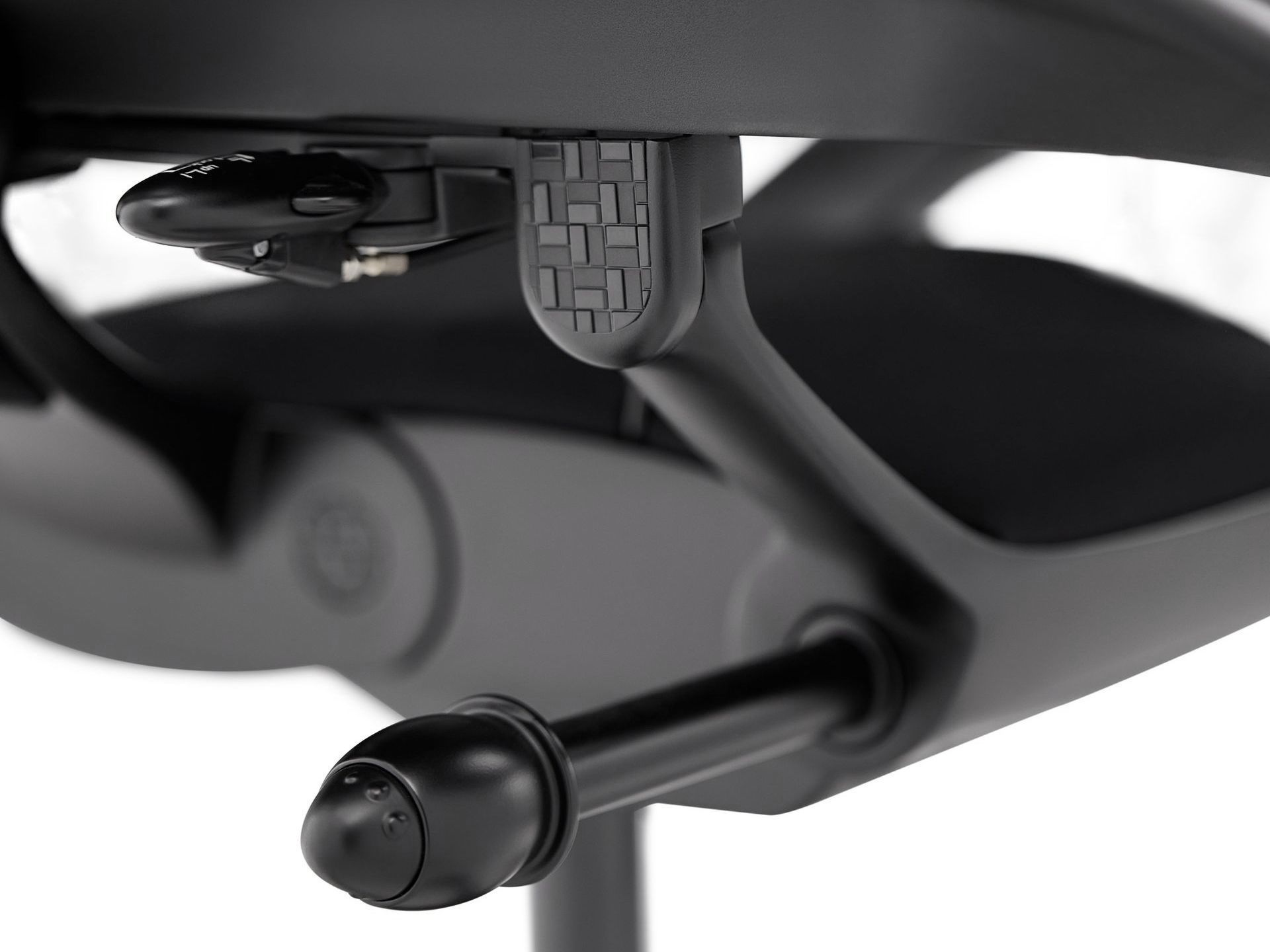 Close up of Ergohuman carbon gaming chair tension lever