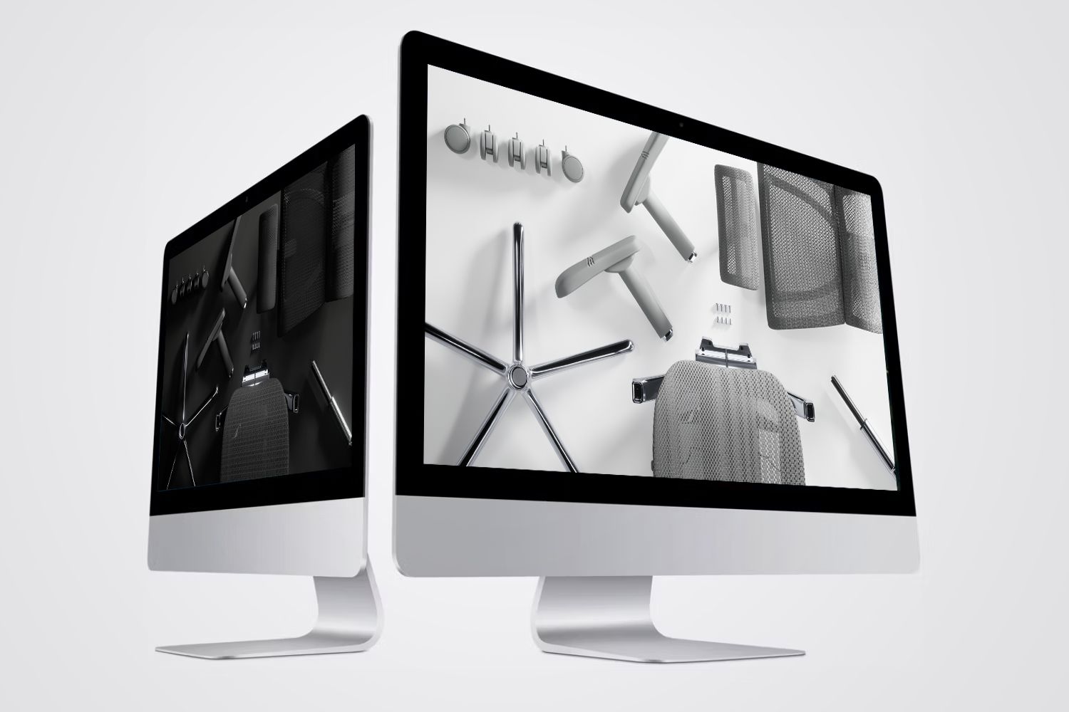 Two monitors display assembly videos videos for the Ergohuman range of office chairs