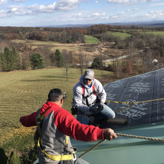 Roofing Service — Shirt and Cap in Schenectady, NY