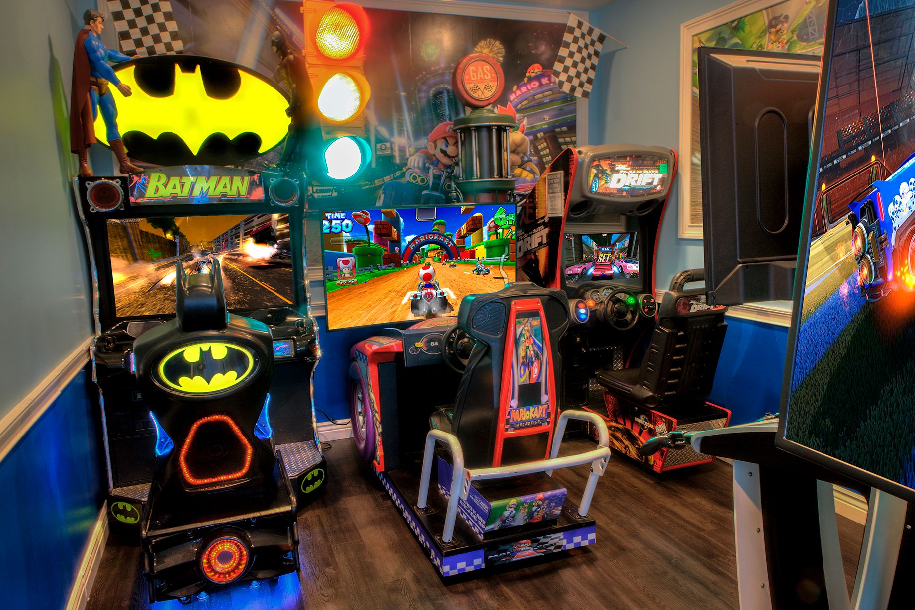 Aqua Dental and Orthodontics in Duncanville, TX. A room filled with arcade games including batman and sonic the hedgehog.