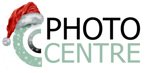 the logo for the photo centre is green and black .